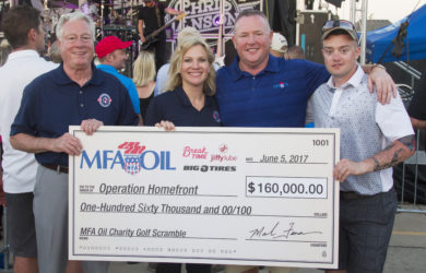 Pictured left to right: John Laws, chairman of the KS/MO Operation Homefront Advisory Board; Kristin Castle, central Midwest program manager for Operation Homefront; Mark Fenner, MFA Oil president and CEO; and Brandon Perry, senior airman with the U.S. Air Force.