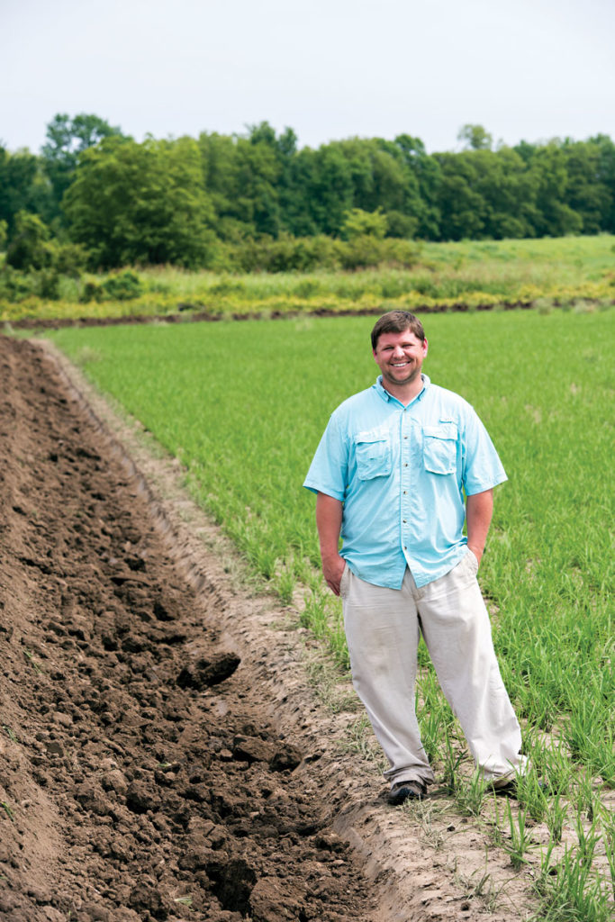 Clayton Miller had some of his rice acreage in northeast Arkansas flooded by heavy rains for more than 20 days, but the crop survived.