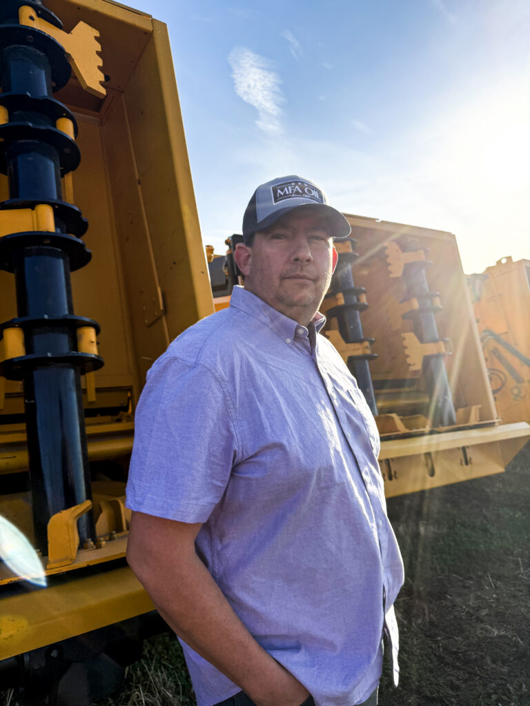 A photo of fourth-generation dairyman David Foster with TerraKat manure spreaders. Foster started the company after
recognizing a need for better equipment options at competitive prices for farmers like himself. Photo by Adam Buckallew.