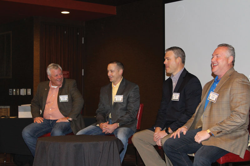 MFA Oil executives participate in a roundtable discussion.