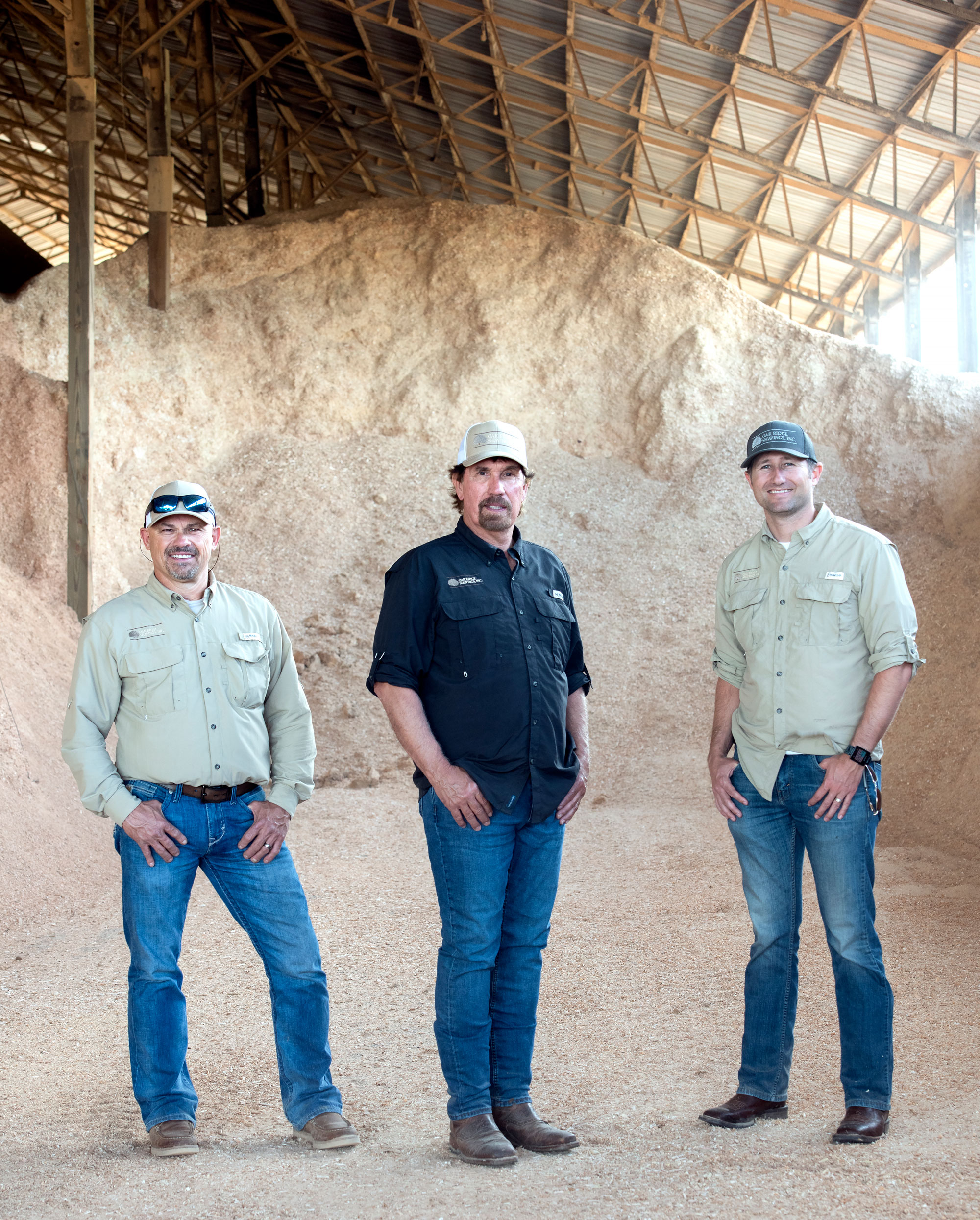 From left, Larry Zebert, Del Oney and Michael Moyer operate Oak Ridge Shavings, a Missouri company that supplies mountains of material for everything from poultry bedding to composite decking.  