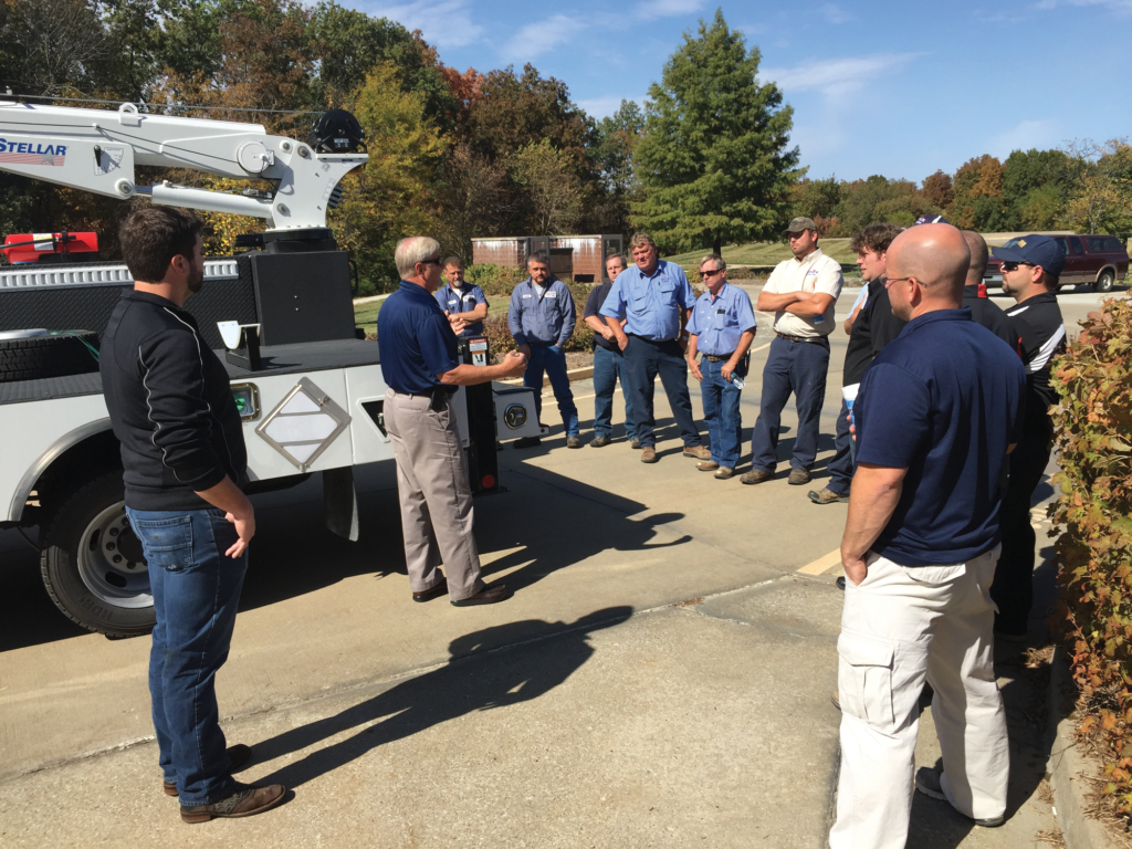 MFA Oil employees participate in a crane truck training session at the company’s headquarters in Columbia, Mo.