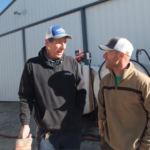 Fifth-generation farmer Garrett Riekhof, right, talks with Brent Fette, a refined fuel driver for MFA Oil.