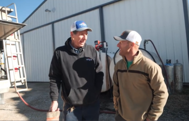 Fifth-generation farmer Garrett Riekhof, right, talks with Brent Fette, a refined fuel driver for MFA Oil.