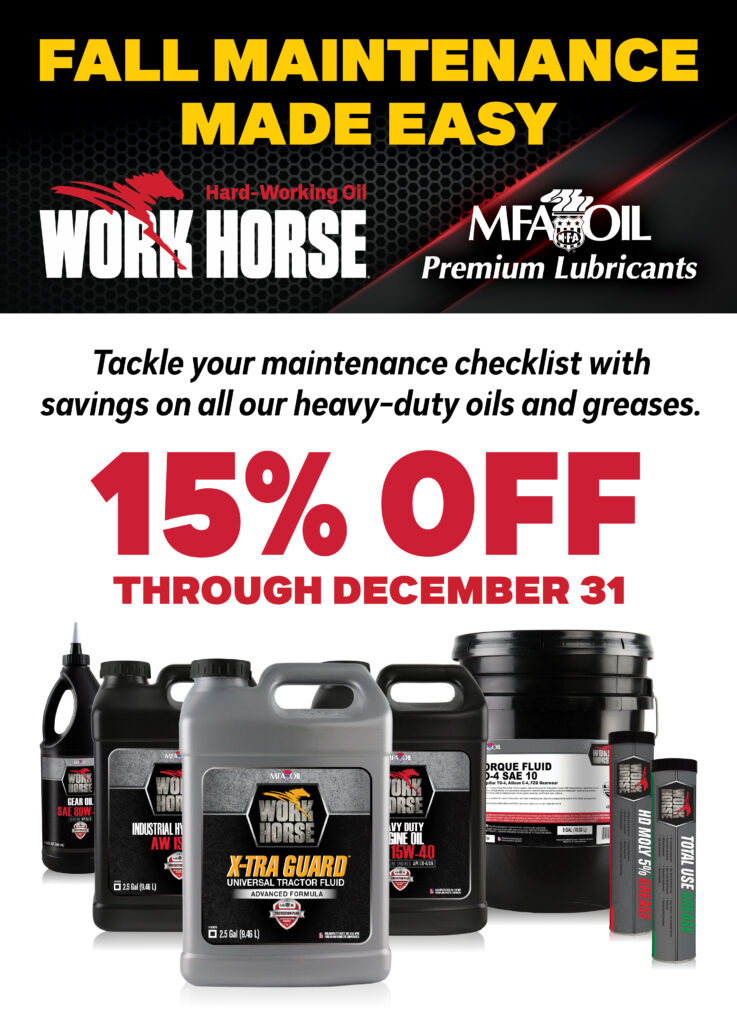 Promotional ad for Work Horse MFA Oil showing heavy-duty oil and grease products, offering 15% off through December 31 for fall maintenance. Bold yellow and red text with product images at the bottom.