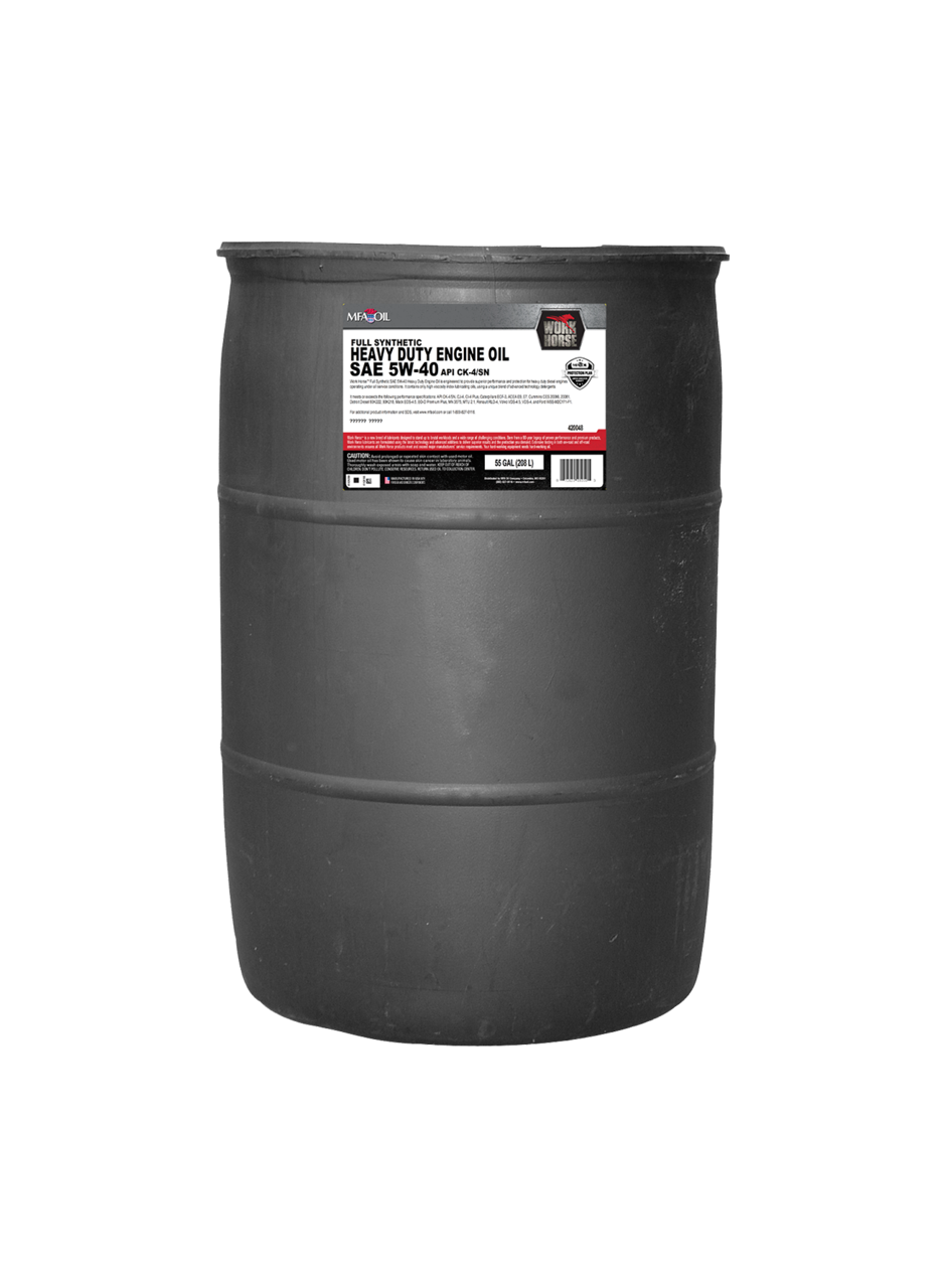 A large black barrel labeled Heavy Duty Engine Oil SAE 5W-40. The front label includes specifications and a logo, with some fine print. The barrel is cylindrical and appears to be made of metal or heavy-duty plastic.