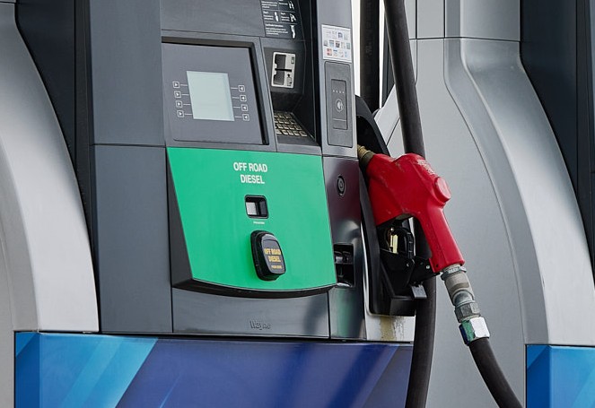 A fuel pump with a green label reading Off Road Diesel and a red fuel nozzle.